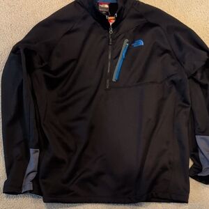 The North Face Men's Black Jacket with Blue Highlights